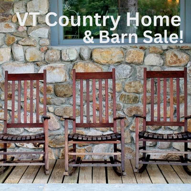 VT Country Home three rocking chairs against a stone wall