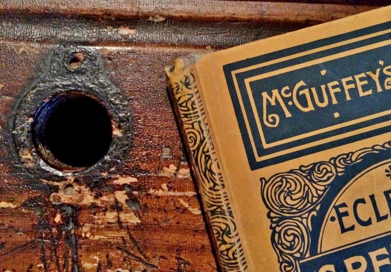 antique school dek with McGuffy's book