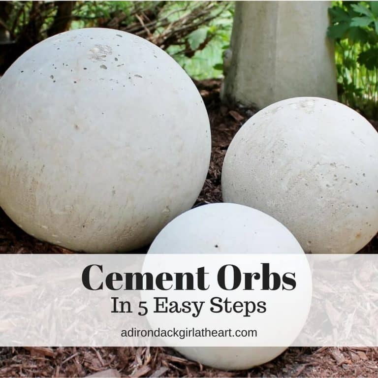 Three Cement Orbs in the Garden