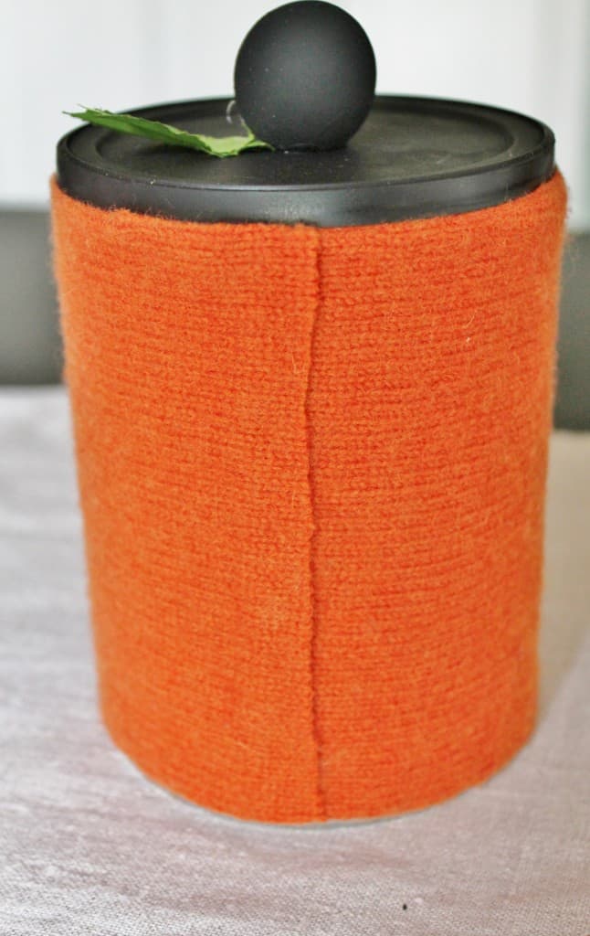 Back of thrifted sweater candy container
