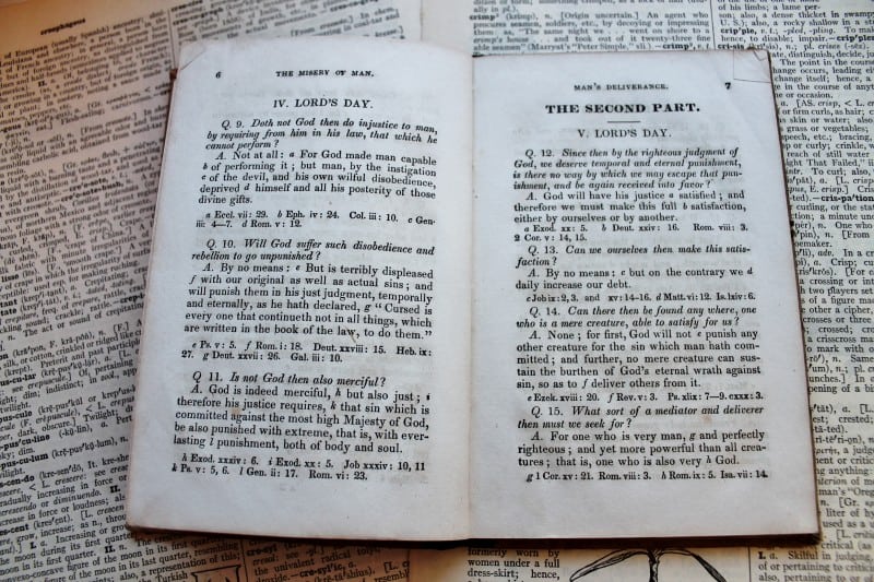 Inside antique catechism book