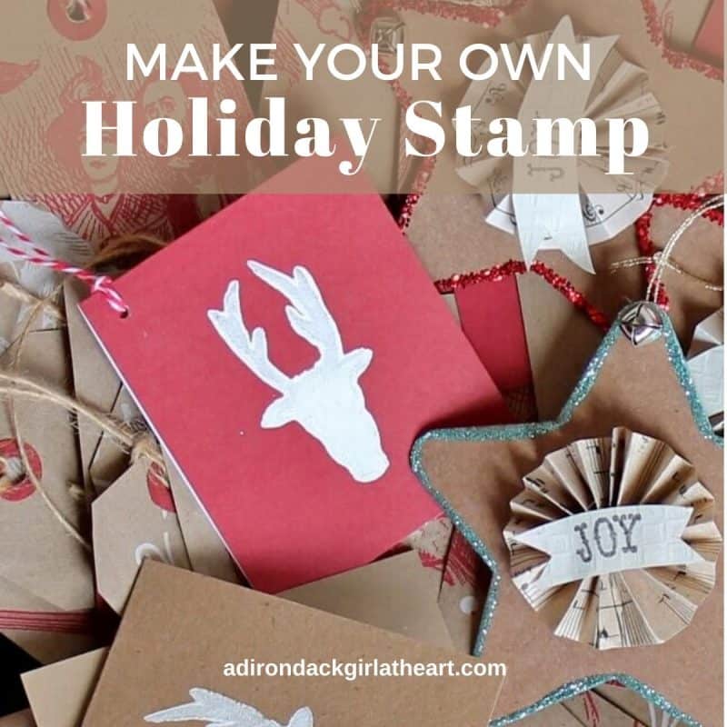 white deer head stamp on red card stock in with other holiday tags