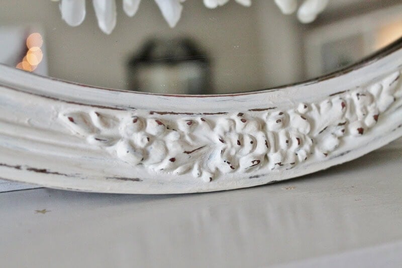 Ornate detail of chalk painted mirror