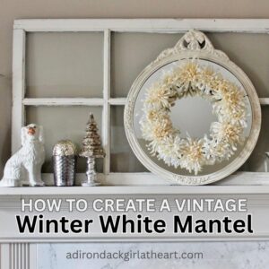 White wreath on a white mirror