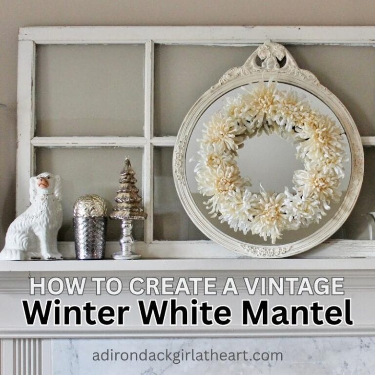 White wreath on a white mirror