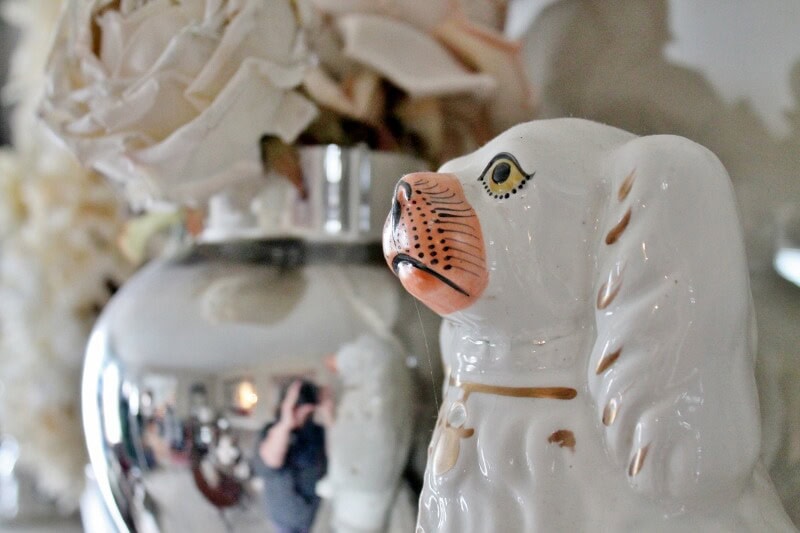 side view of antique white staffordshire dog