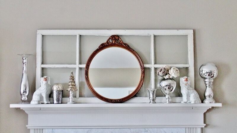winter white mantel with vintage gold mirror