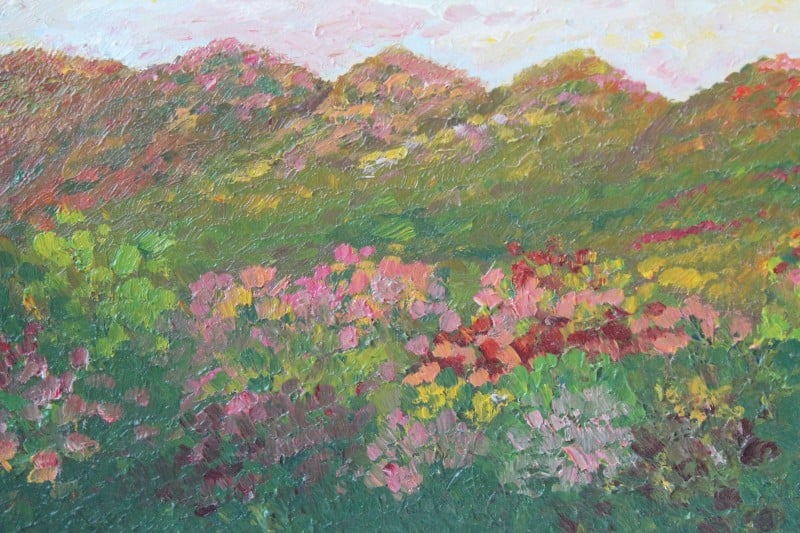 closeup of impressionistic landscape painting