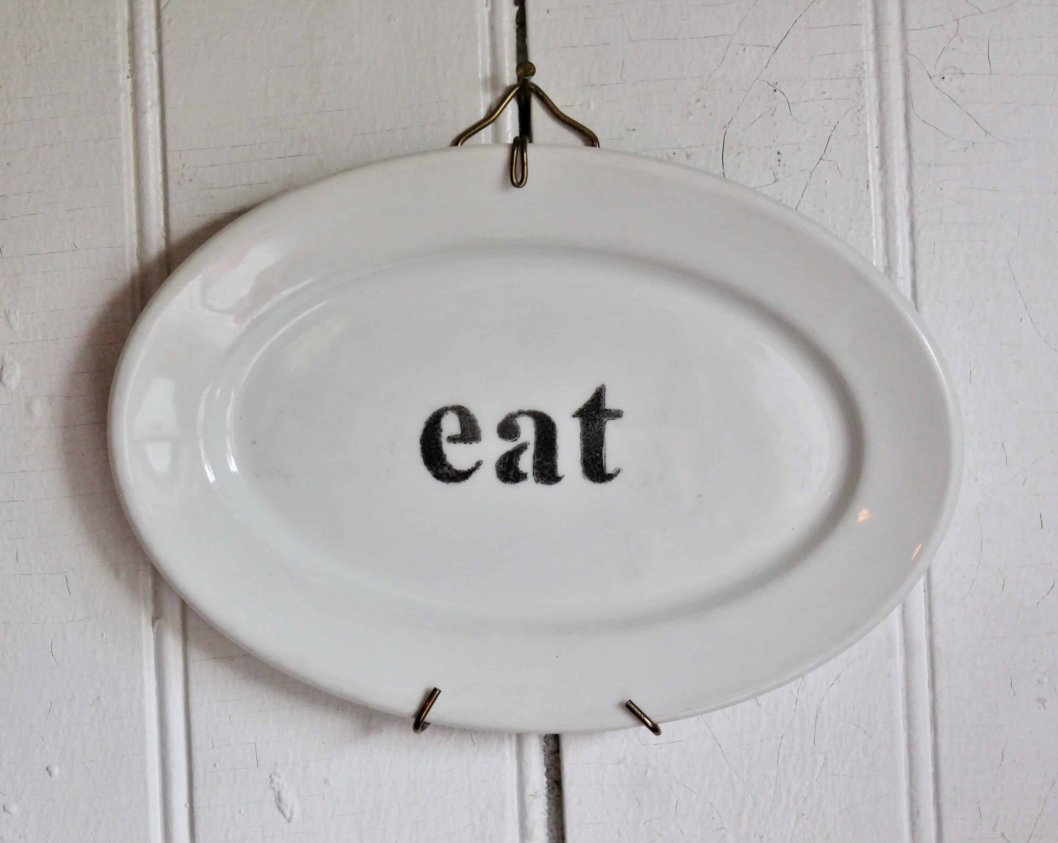 Eat sign on vintage platter