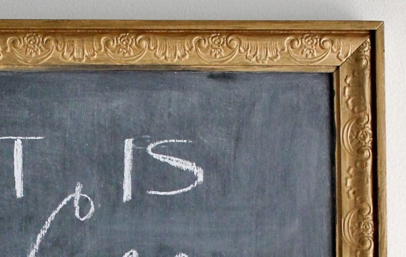 Close up of ornate frame turned blackboard