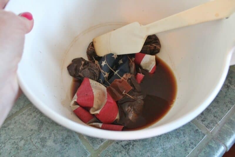 Vintage flag soaking in tea dye