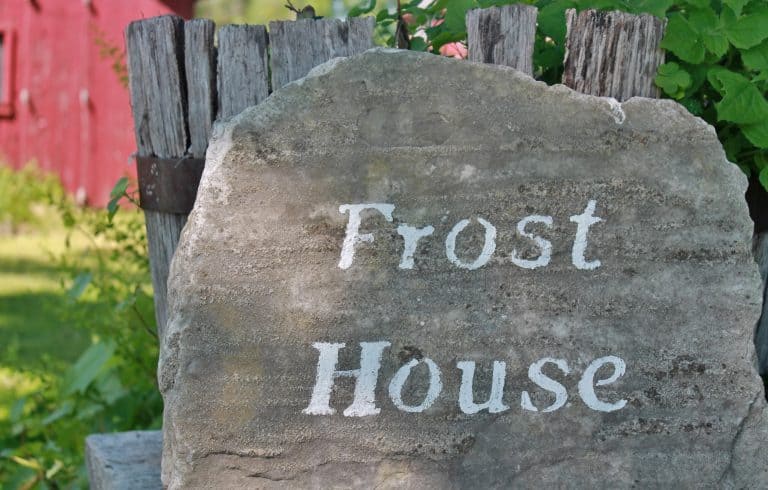 Frost House stenciled on stone