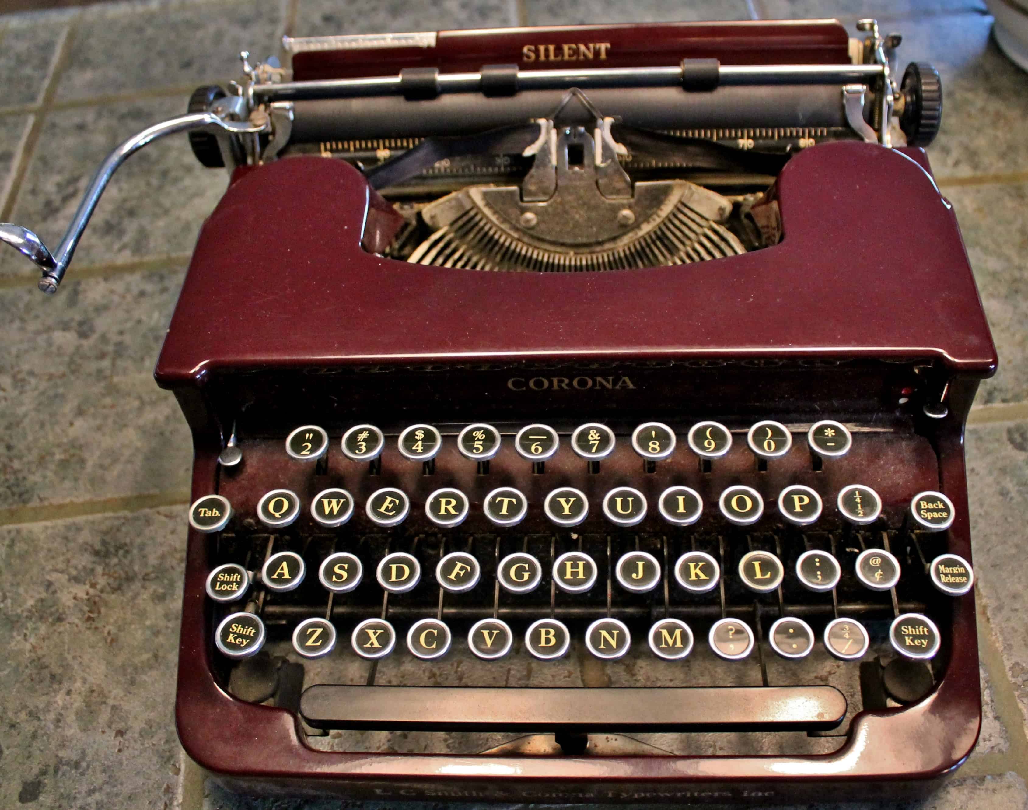 Antique Corona Typewriter in maroon