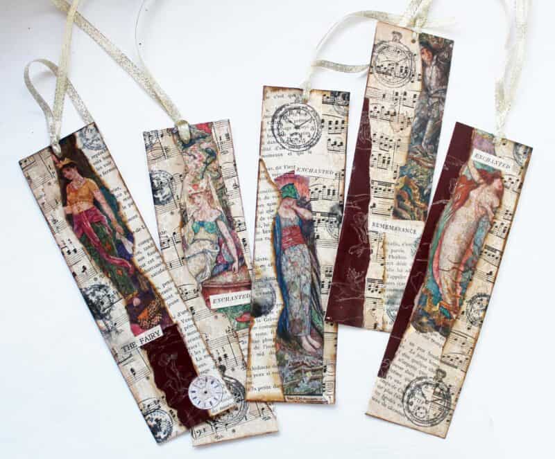 5 finished mixed media bookmarks with dark red highlights