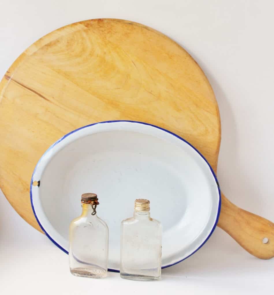 pizza-board-enamelware-dish-old-bottles-949x1024