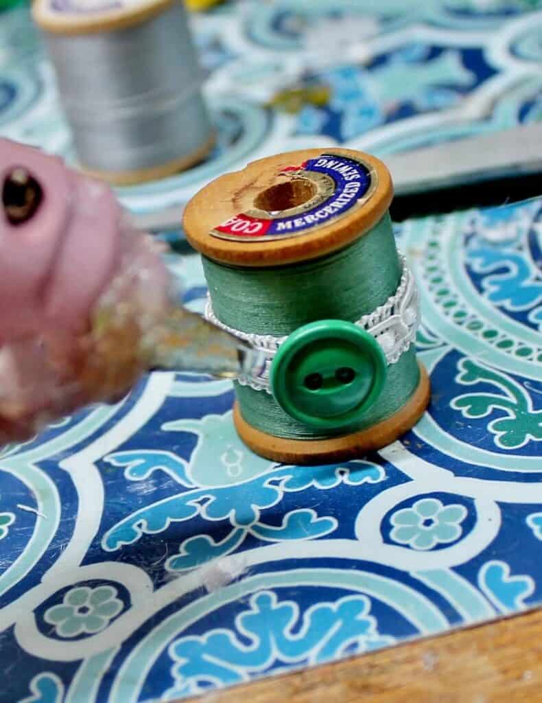 Hot glue button on