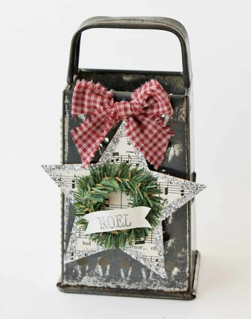 music paper star with wreath decorating a box grater