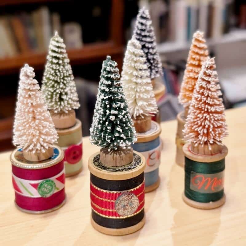7 bottle brush tree and thread spool decorations