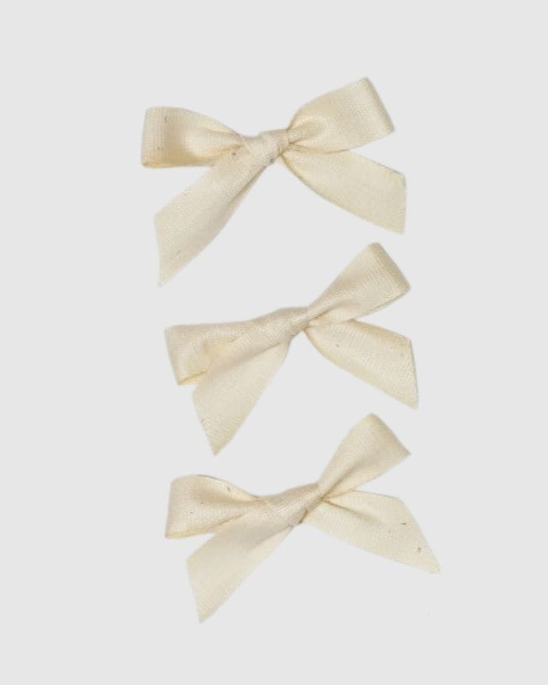 3 small antique white bows
