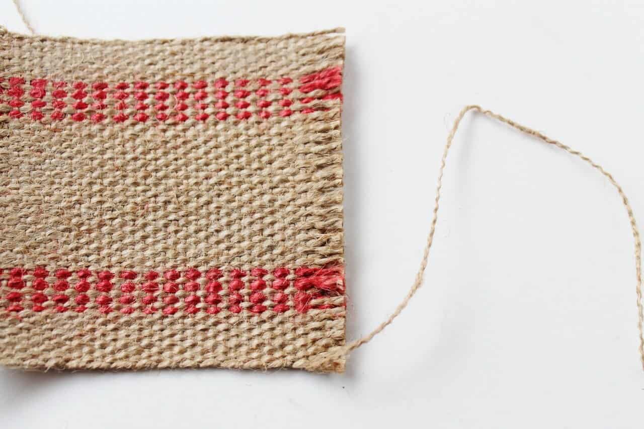 Piece of frayed jute webbing