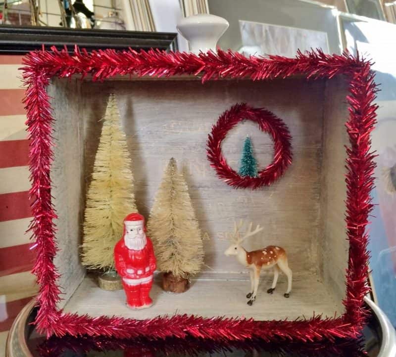 Vintage cigar box diorama with santa and a deer