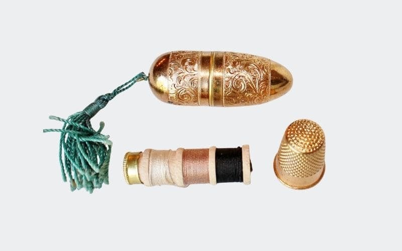 gold bullet shaped sewing kit