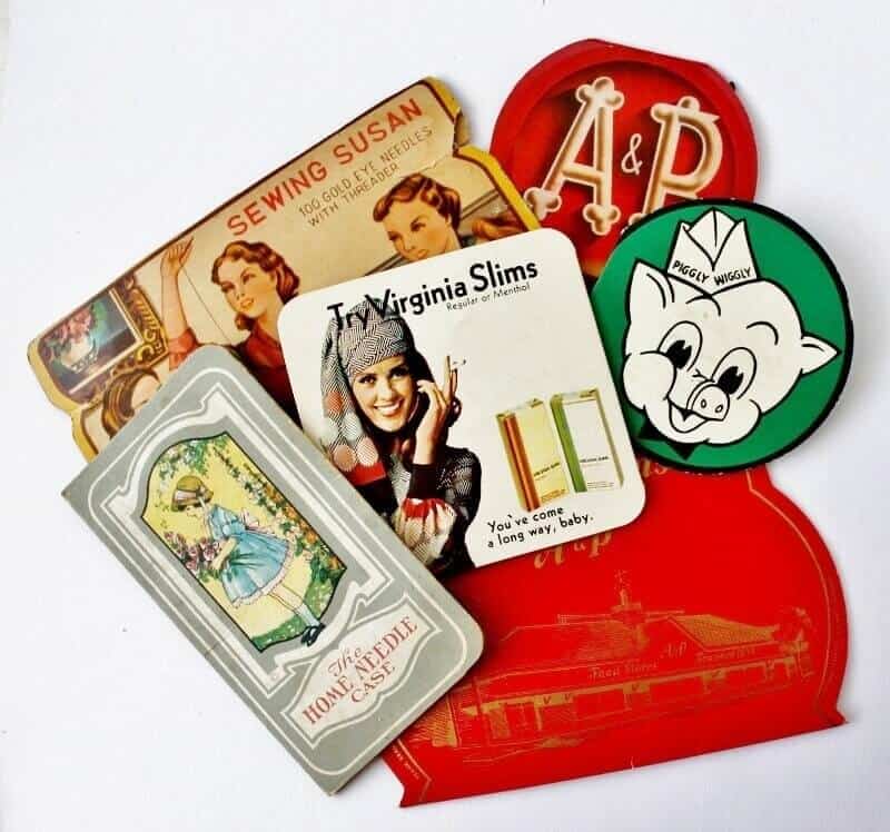 small collection of colorful vintage needle cases