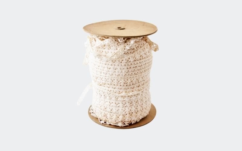 ivory lace on a spool