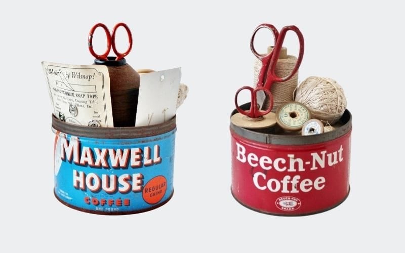 1 blue tin, 1 red with vintage sewing notions