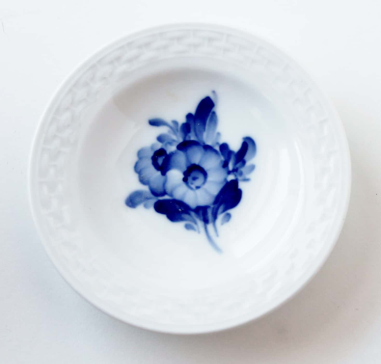 blue and white royal copenhagen butter pat