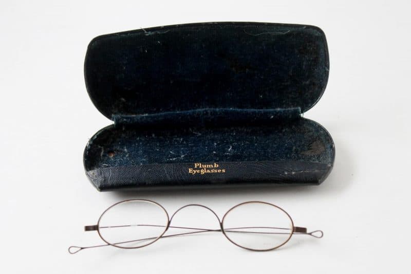 pair of antique spectacles and case