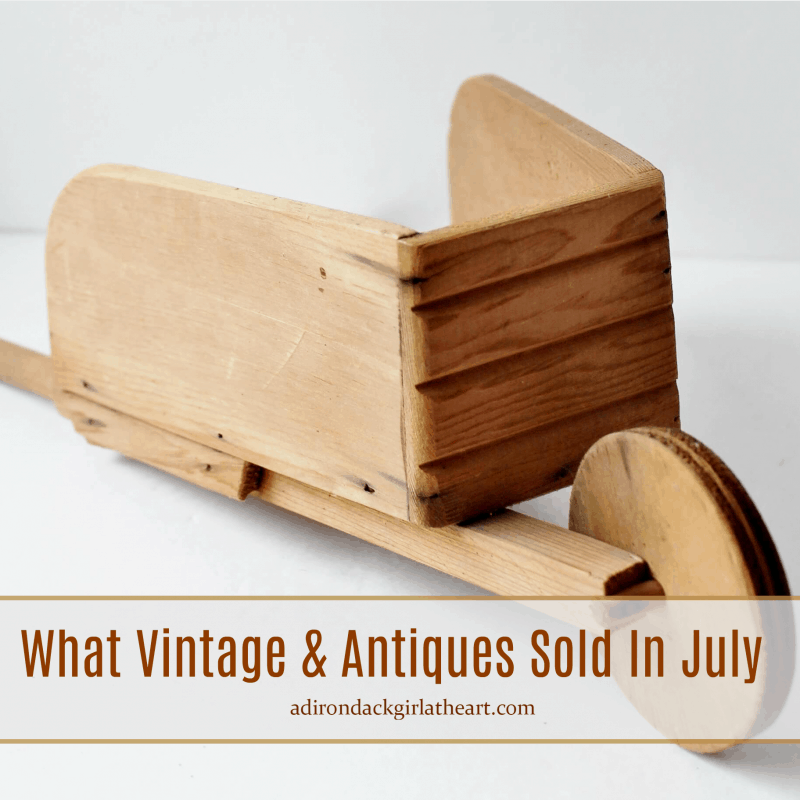 vintage wooden decorative wheel barrow