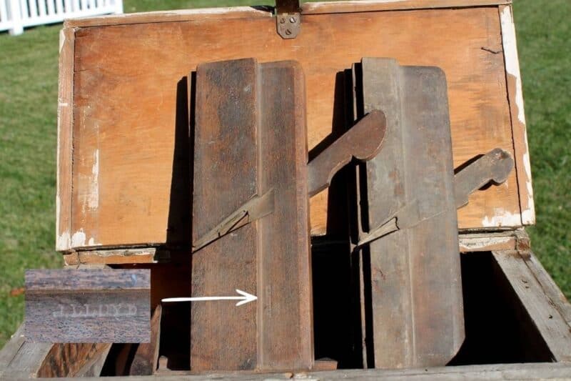 Pair of antique molding planes in tool box