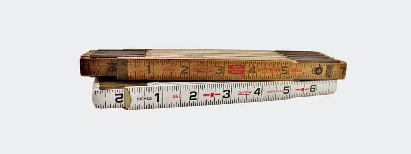 vintage yellow and white folding rulers