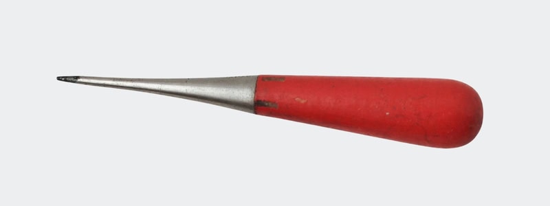 vintage awl with red handle