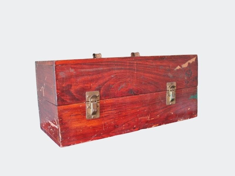 vintage orange-ish wooden tool box