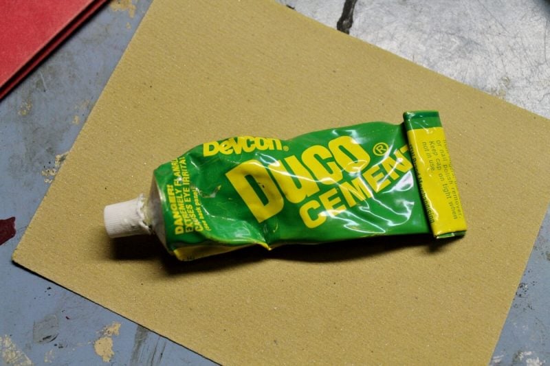 sand paper and duco cement