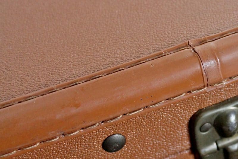 vinyl suitcase after shot