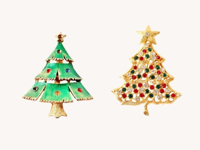 Pair of christmas tree ornaments one green, one gold with lots of rhinestones