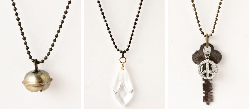 3 vintage pendants: bell, crystal, key