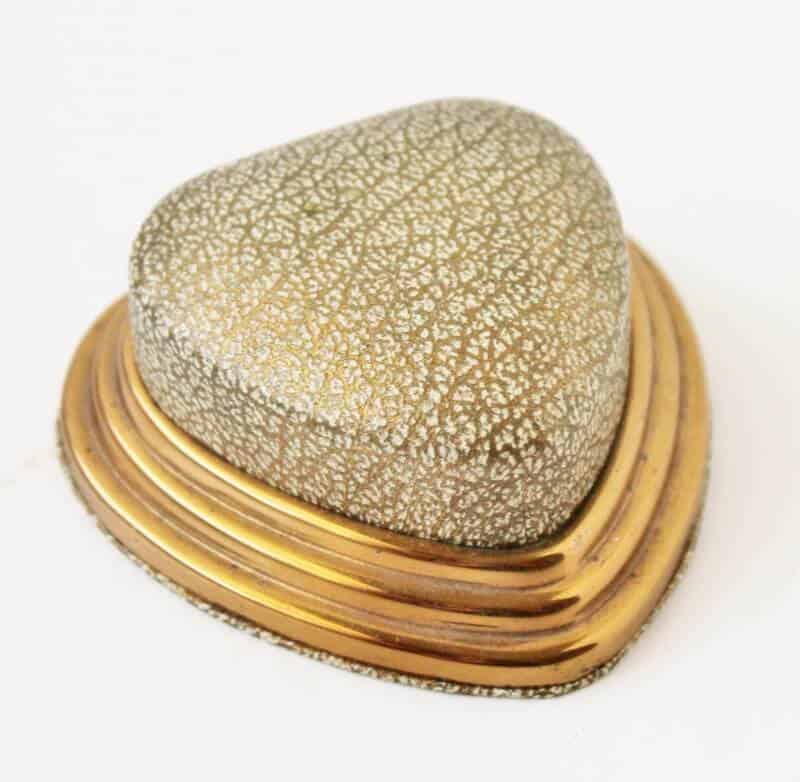 gold and greenish heart-shaped ring box