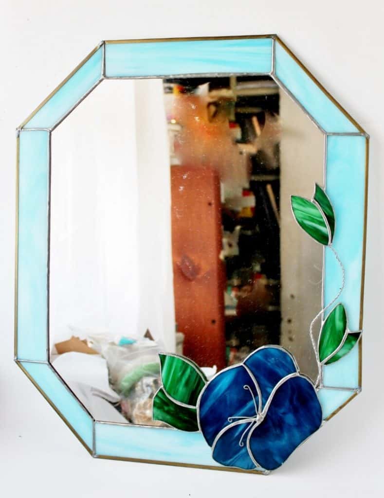 What's selling in vintage and antiques: mirror with light blue stained glass edge and blue flower