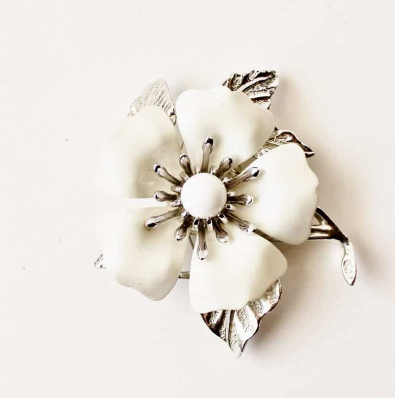 white enamel floral brooch