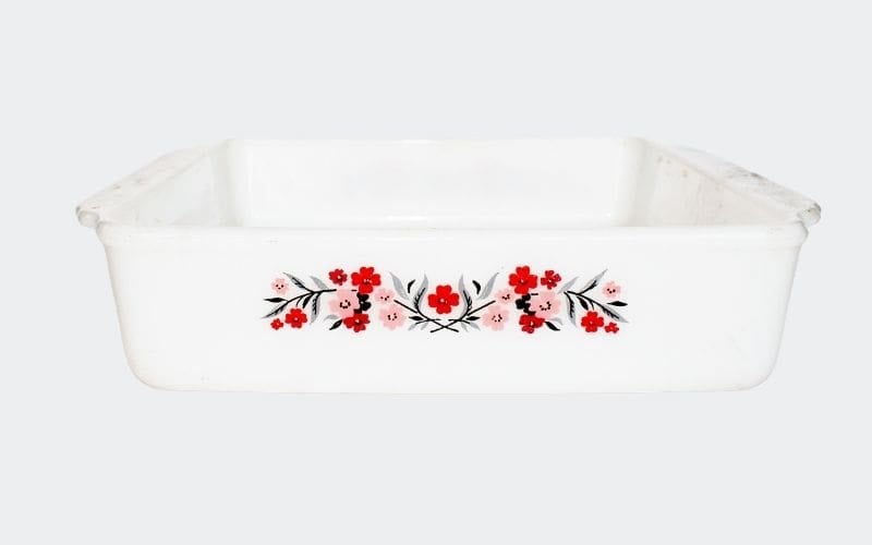 white baking dish with red floral pattern