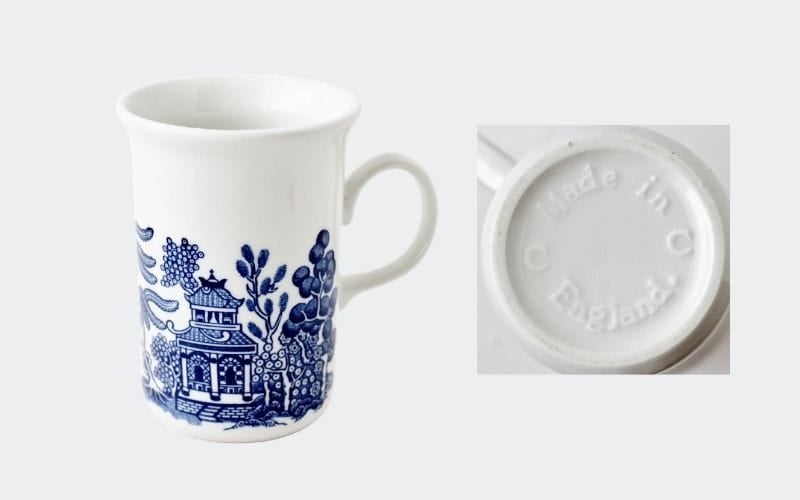 white mug with blue willow decoration and mark: England