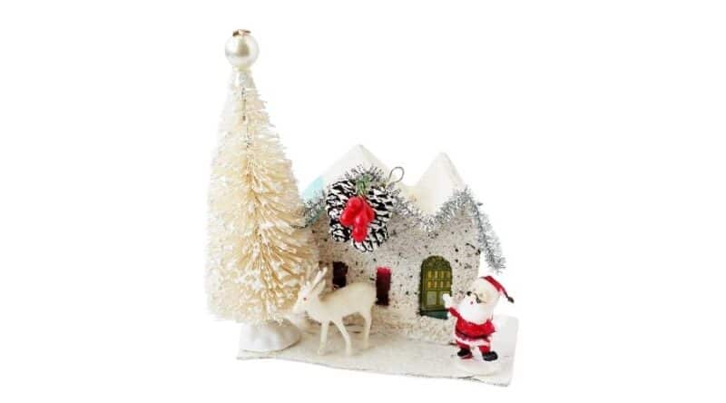 white embellished putz house with santa