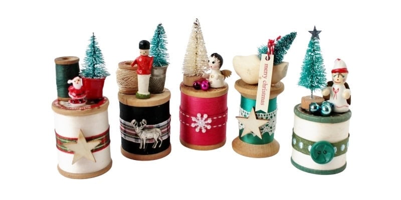 Mini dioramas on large spools of thread