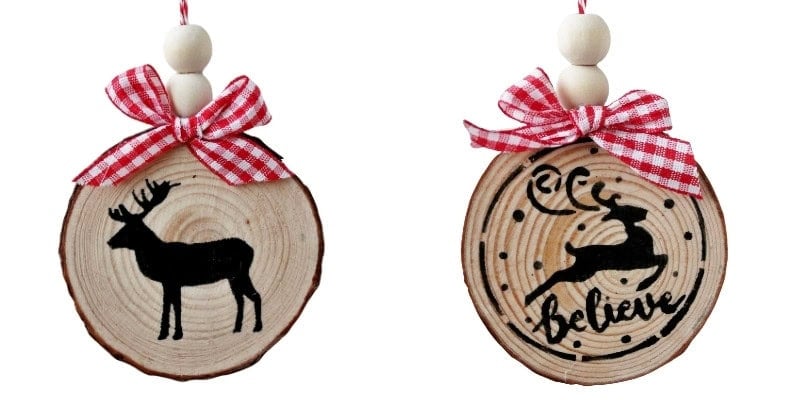 Wood slice christmas ornaments with stenciled deer