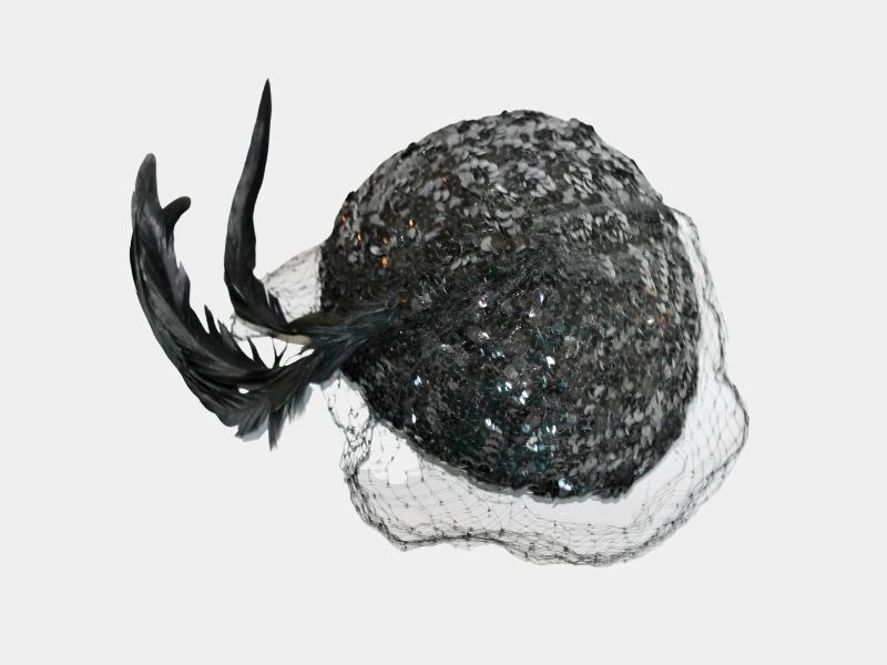 Antique black hat with feathers and netting