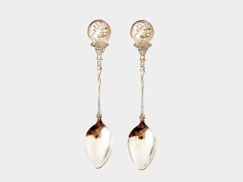 Pair of souvenir silver spoons depicting Charles & Diana